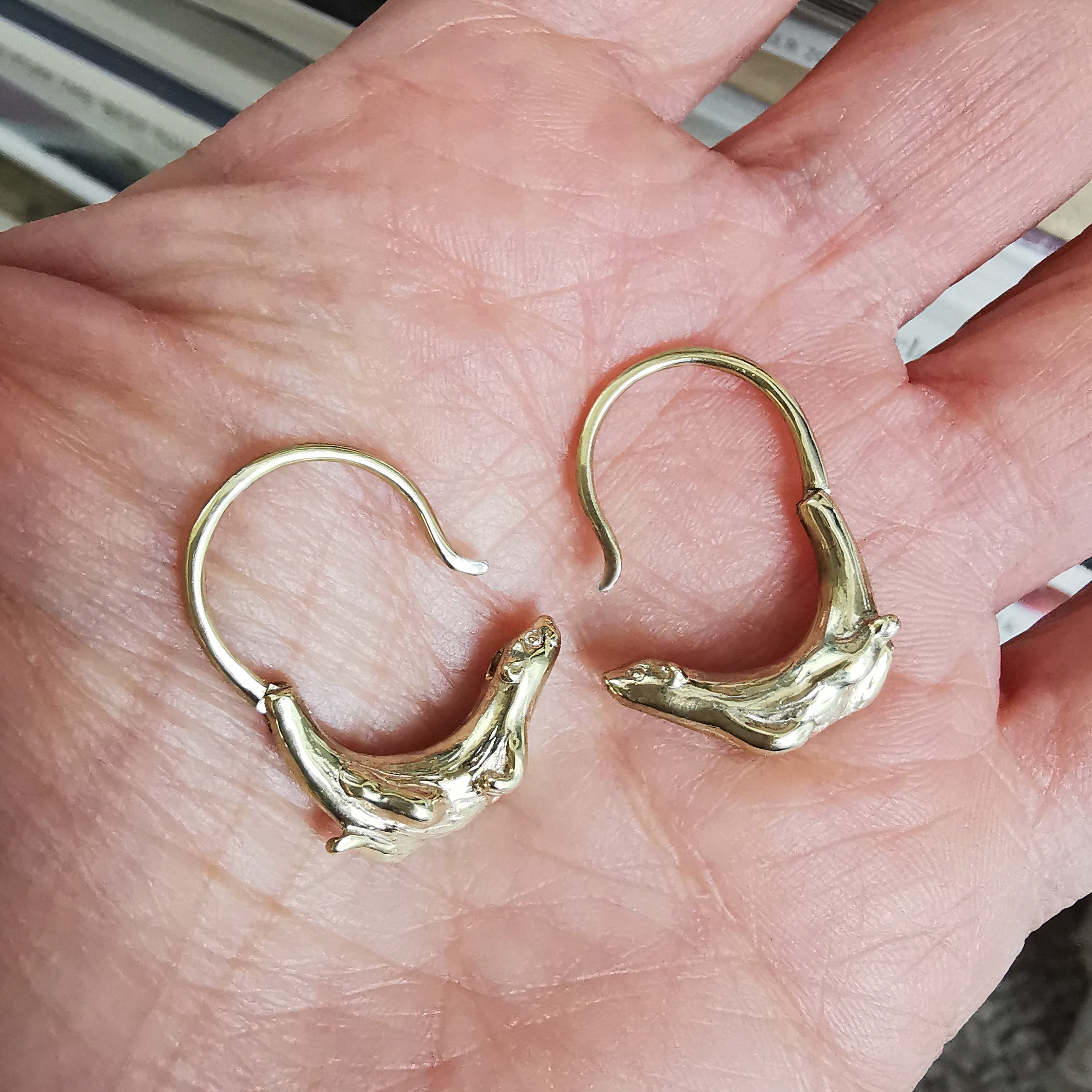 Otter earrings shop