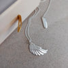 Collar con colgante de ala