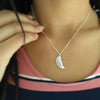 Collar con colgante de ala